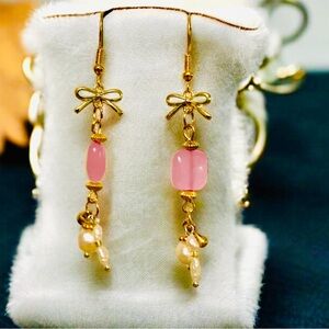 Super feminine coquette style,  Flirty gold earrings with bows and pink stones